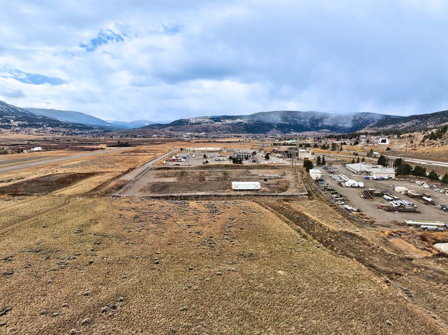 Aerial view over the Airport Road lands in Merritt, with the hills of the Nicola Valley behind